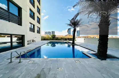 Pool image for: Apartment - 1 Bedroom - 2 Bathrooms for rent in District 10 - Jumeirah Village Circle - Dubai, Image 1