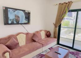 Living Room image for: Apartment - 1 bedroom - 2 bathrooms for rent in Al Rashidiya Towers - Ajman Downtown - Ajman, Image 1