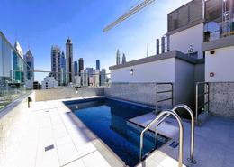 صورةحوض سباحة لـ: شقة - 1 غرفة نوم - 2 حمامات للكراء في جميرا جاردن سيتي - السطوة - دبي, صورة 1