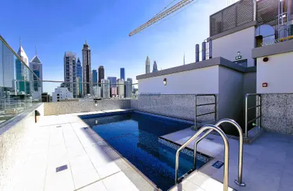 Pool image for: Apartment - 1 Bedroom - 2 Bathrooms for rent in Jumeirah Garden City - Al Satwa - Dubai, Image 1