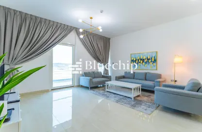 Living Room image for: Apartment - 2 Bedrooms - 3 Bathrooms for rent in Zubaida Residency - Majan - Dubai, Image 1