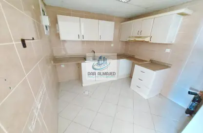صورة لـ مطبخ شقة - 1 حمام للايجار في مجمع النهدة السكني - النهدة - الشارقة ، صورة رقم 1