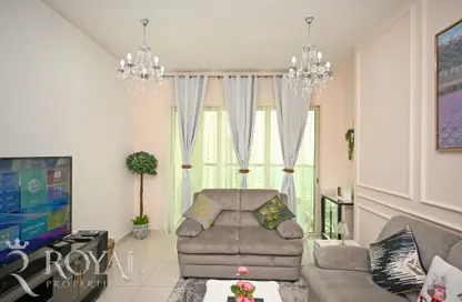 Living Room image for: Apartment - 1 Bedroom - 2 Bathrooms for sale in Burooj Views - Marina Square - Al Reem Island - Abu Dhabi, Image 1