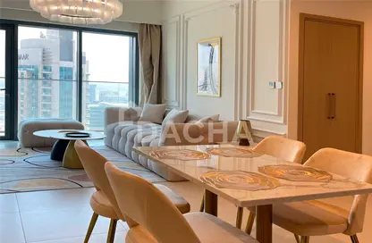 Living / Dining Room image for: Apartment - 2 Bedrooms - 2 Bathrooms for rent in Burj Royale - Downtown Dubai - Dubai, Image 1