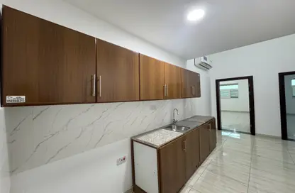 Apartment - 1 Bedroom - 2 Bathrooms for rent in Mohamed Bin Zayed Centre - Mohamed Bin Zayed City - Abu Dhabi