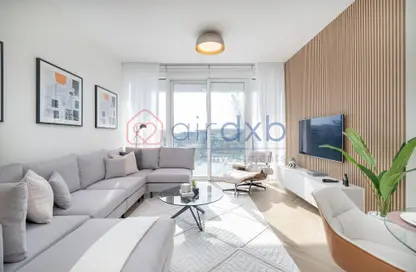 Living Room image for: Apartment - 1 Bedroom - 2 Bathrooms for rent in 1 Residences - Wasl1 - Al Kifaf - Dubai, Image 1