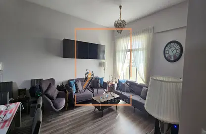 Living Room image for: Apartment - 3 Bedrooms - 3 Bathrooms for sale in Wadi Al Safa 2 - Dubai, Image 1