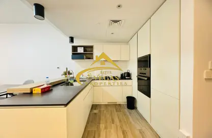 Kitchen image for: Apartment - 1 Bedroom - 2 Bathrooms for rent in Belgravia Square - Jumeirah Village Circle - Dubai, Image 1
