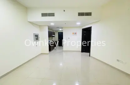 Apartment - 1 Bedroom - 2 Bathrooms for rent in Burj Residence 2 - Jumeirah Village Circle - Dubai