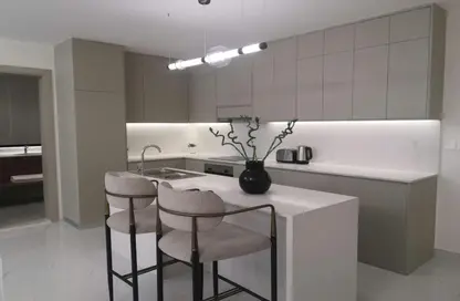 صورة لـ مطبخ شقة - غرفة نوم - 2 حمامات للبيع في إكويتي أركيد - الفرجان - دبي ، صورة رقم 1