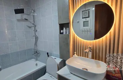 شقة - 2 غرف نوم - 3 حمامات للايجار في أورينت تاور 1 - أورينت تاور - البستان - عجمان