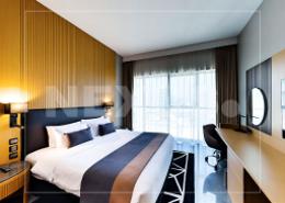 Room / Bedroom image for: Studio - 1 bathroom for sale in Sky Bay Hotel - Business Bay - Dubai, Image 1
