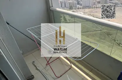 شقة - غرفة نوم - 2 حمامات للبيع في أورينت تاور 1 - أورينت تاور - البستان - عجمان