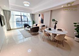 Living / Dining Room image for: Apartment - 1 bedroom - 2 bathrooms for sale in Gulfa Towers - Al Rashidiya 1 - Al Rashidiya - Ajman, Image 1