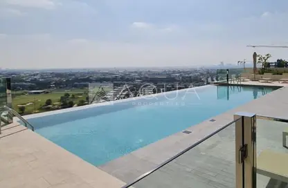 Pool image for: Apartment - 2 Bedrooms - 2 Bathrooms for rent in Golf Suites - Dubai Hills - Dubai Hills Estate - Dubai, Image 1