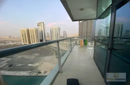 صورة لـ شرفة شقة - 2 غرف نوم - 2 حمامات للبيع في برج الواحة - مدينة دبي الرياضية - دبي ، صورة رقم 1