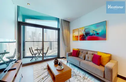 صورة لـ غرفة المعيشة شقة - غرفة نوم - 1 حمام للايجار في 15 نورث سايد - الخليج التجاري - دبي ، صورة رقم 1
