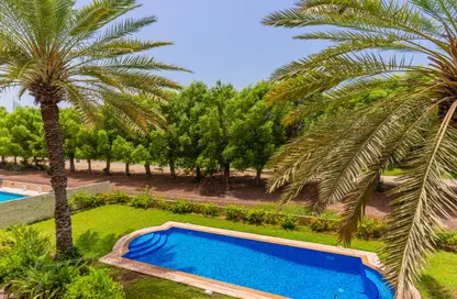 Pool image for: Villa - 6 Bedrooms - 7 Bathrooms for sale in Hattan 1 - Hattan - The Lakes - Dubai, Image 1