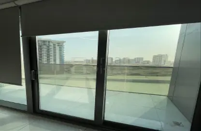 صورة لـ شرفة شقة - غرفة نوم - 2 حمامات للبيع في برج بلو ويفز - مجمع دبي ريزيدنس - دبي ، صورة رقم 1