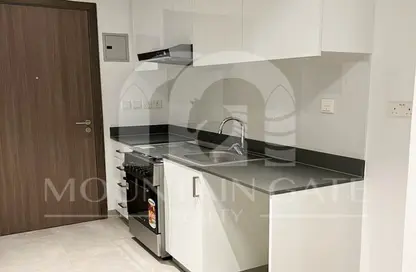 Kitchen image for: Apartment - 1 Bathroom for sale in Areej Apartments - Aljada - Sharjah, Image 1