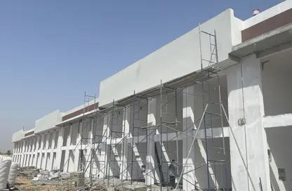 عمارة بالكامل - استوديو - 2 حمامات للبيع في الحليو 1 - الحليو - عجمان
