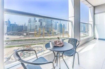 Balcony image for: Apartment - 1 Bedroom - 2 Bathrooms for rent in Tower B - DAMAC Towers by Paramount - Business Bay - Dubai, Image 1