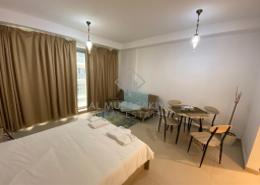 Living / Dining Room image for: Studio - 1 bathroom for rent in Pacific Samoa - Pacific - Al Marjan Island - Ras Al Khaimah, Image 1
