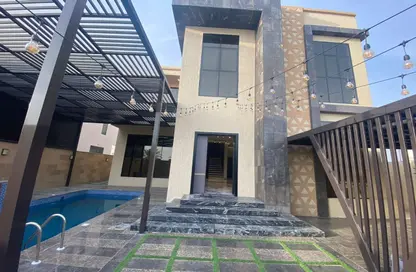 Outdoor House image for: Villa - 4 Bedrooms - 7 Bathrooms for rent in Ajman Hills - Al Alia - Ajman, Image 1