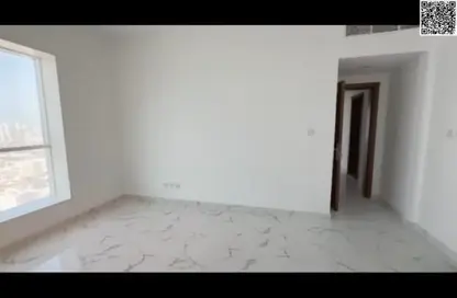 Apartment - 2 Bedrooms - 2 Bathrooms for sale in Oasis Tower - Al Rashidiya 1 - Al Rashidiya - Ajman