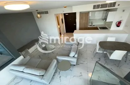 Living / Dining Room image for: Apartment - 2 Bedrooms - 3 Bathrooms for sale in Al Raha Lofts - Al Raha Beach - Abu Dhabi, Image 1