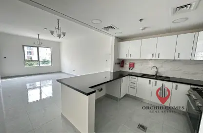 Kitchen image for: Apartment - 2 Bedrooms - 2 Bathrooms for rent in PARK TERRACE - Arjan - Dubai, Image 1