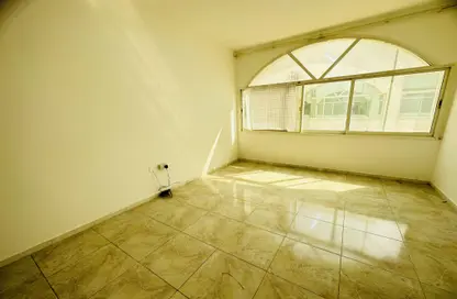 Empty Room image for: Apartment - 1 Bathroom for rent in Al Rawda Arjaan By Rotana - Al Wahda - Abu Dhabi, Image 1