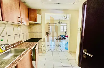 شقة - 1 حمام للايجار في بي 20 - طراز فرنسي - المدينة العالمية - دبي