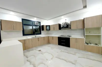 صورة لـ مطبخ فيلا - 4 غرف نوم - 5 حمامات للبيع في 1 المويهات - المويهات - عجمان ، صورة رقم 1