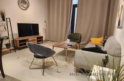Living Room image for: Apartment - 1 Bedroom - 1 Bathroom for rent in Warda Apartments - Town Square - Dubai, Image 1