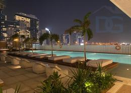 صورةحوض سباحة لـ: Studio - 1 حمام للكراء في رأسًا على عقب - الخليج التجاري - دبي, صورة 1