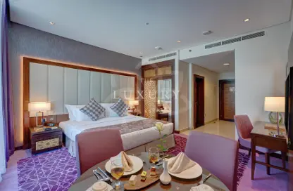Apartment - Studio - 1 Bathroom for rent in Royal Continental Suites - Business Bay - Dubai