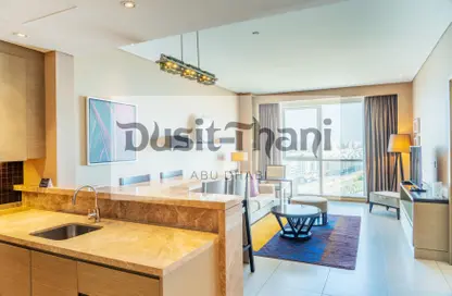 Kitchen image for: Hotel  and  Hotel Apartment - 2 Bedrooms - 2 Bathrooms for rent in Dusit Thani Complex - Al Nahyan Camp - Abu Dhabi, Image 1