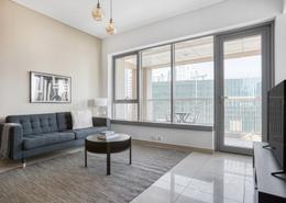 Living Room image for: Apartment - 1 bedroom - 2 bathrooms for rent in 29 Burj Boulevard Tower 1 - 29 Burj Boulevard - Downtown Dubai - Dubai, Image 1