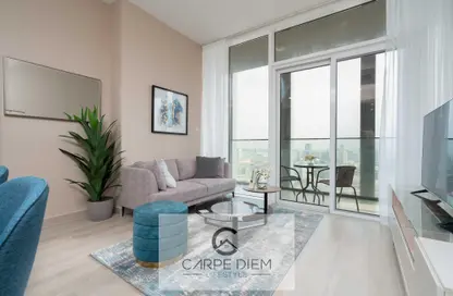 Living Room image for: Apartment - 1 Bedroom - 1 Bathroom for rent in Bloom Towers B - Bloom Towers - Jumeirah Village Circle - Dubai, Image 1