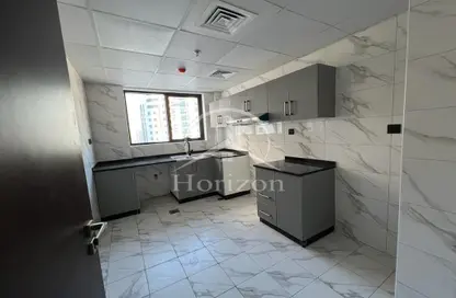 Kitchen image for: Apartment - 1 Bedroom - 2 Bathrooms for rent in Al Taawun - Sharjah, Image 1