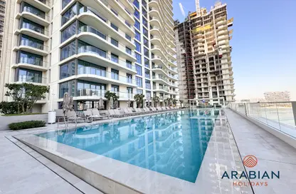 Pool image for: Apartment - 2 Bedrooms - 3 Bathrooms for rent in EMAAR Beachfront - Dubai Harbour - Dubai, Image 1