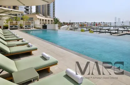Pool image for: Apartment - 1 Bedroom - 2 Bathrooms for sale in Vida Residences Creek Beach - Creek Beach - Dubai Creek Harbour (The Lagoons) - Dubai, Image 1