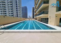 Pool image for: Apartment - 3 bedrooms - 4 bathrooms for rent in Dunes Tower - Jumeirah Village Circle - Dubai, Image 1