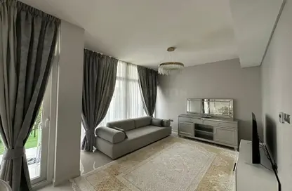 صورة لـ غرفة المعيشة تاون هاوس - 3 غرف نوم - 3 حمامات للبيع في فلل اكنان - فاردون - داماك هيلز 2 - دبي ، صورة رقم 1