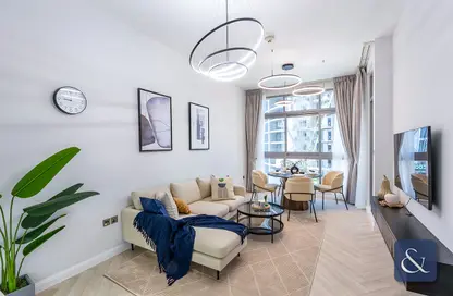 Living Room image for: Apartment - 1 Bedroom - 2 Bathrooms for rent in Iris Blue - Dubai Marina - Dubai, Image 1