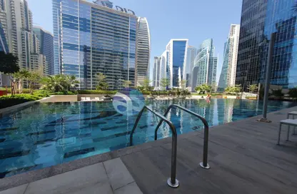 صورة لـ حوض سباحة شقة - غرفة نوم - 1 حمام للايجار في برج زادا - الخليج التجاري - دبي ، صورة رقم 1