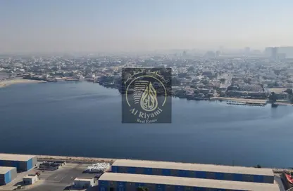 شقة - غرفة نوم - 2 حمامات للايجار في أورينت تاور 1 - أورينت تاور - البستان - عجمان