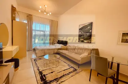 Living / Dining Room image for: Apartment - 1 Bathroom for rent in Pantheon Elysee - Jumeirah Village Circle - Dubai, Image 1