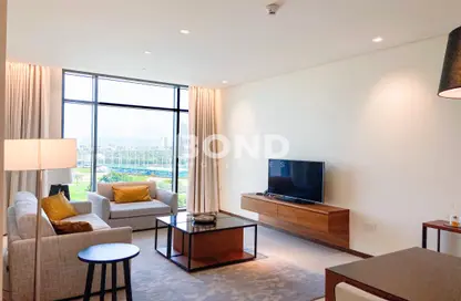 Living Room image for: Apartment - 1 Bedroom - 2 Bathrooms for rent in Vida Residence 2 - Vida Residence - The Hills - Dubai, Image 1